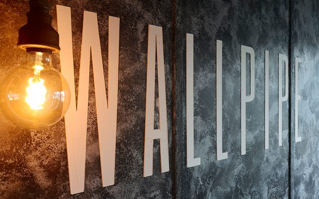 Wallpipe logo og lampe